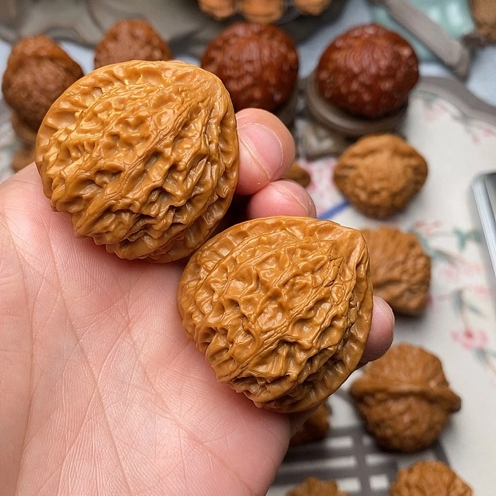 橙***+文玩核桃把件金牛