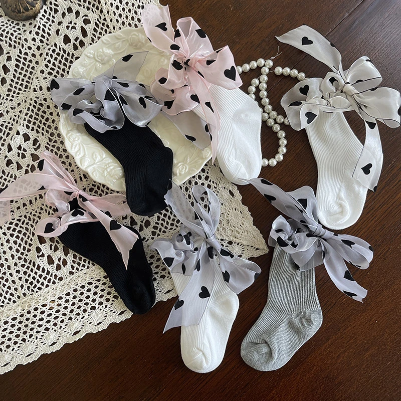 爱心绸缎蝴蝶结可爱公主女儿宝宝学生脚跟棉堆堆短袜女