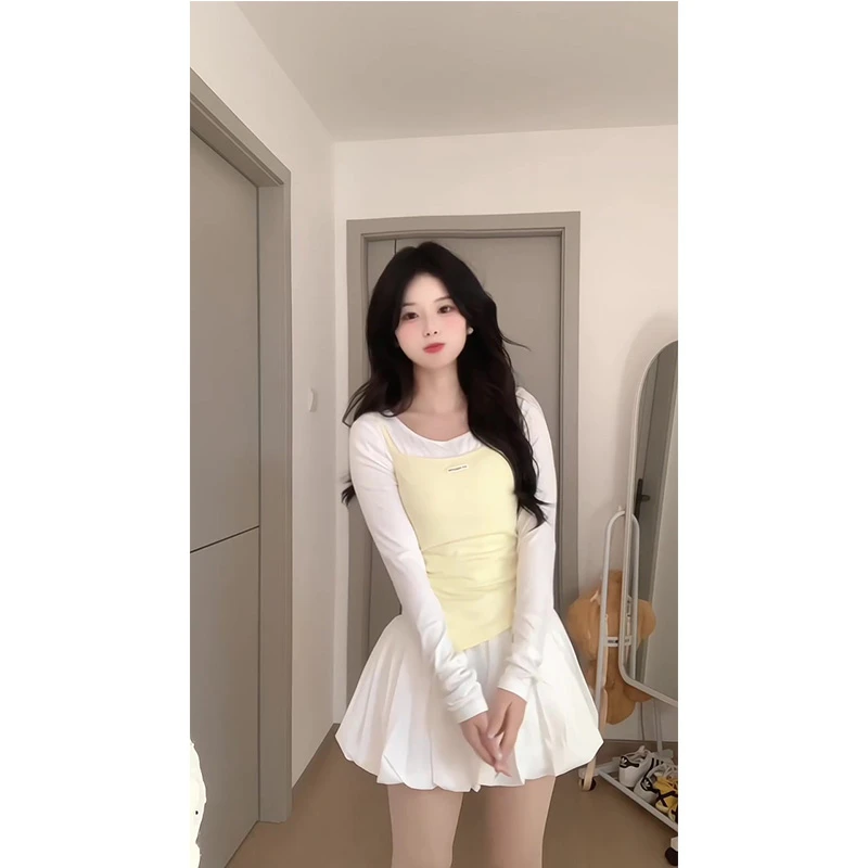 早春心机叠穿淡黄色吊带背心不规则斜肩内搭打底衫女花苞裙套装