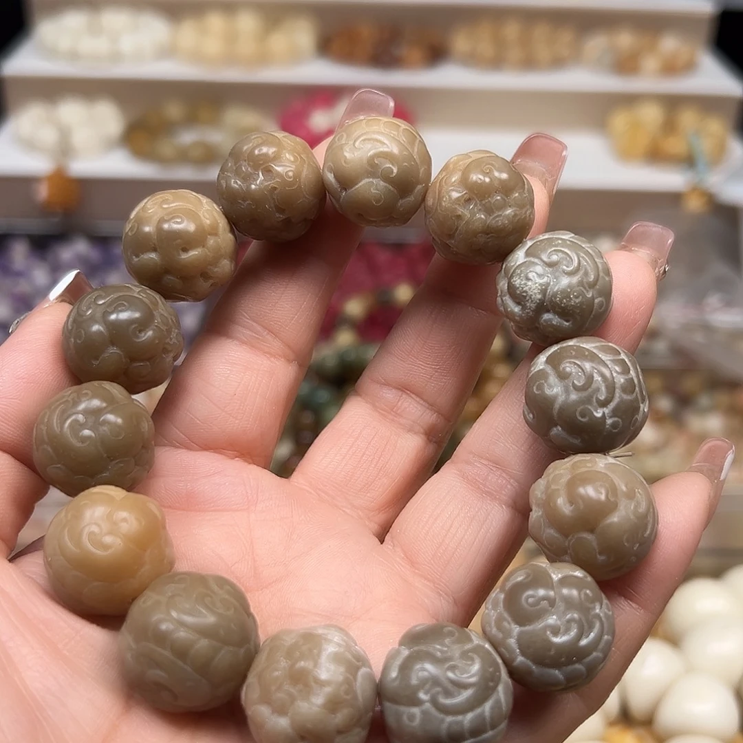 手串菩提根/象牙果瑕疵貔貅1条