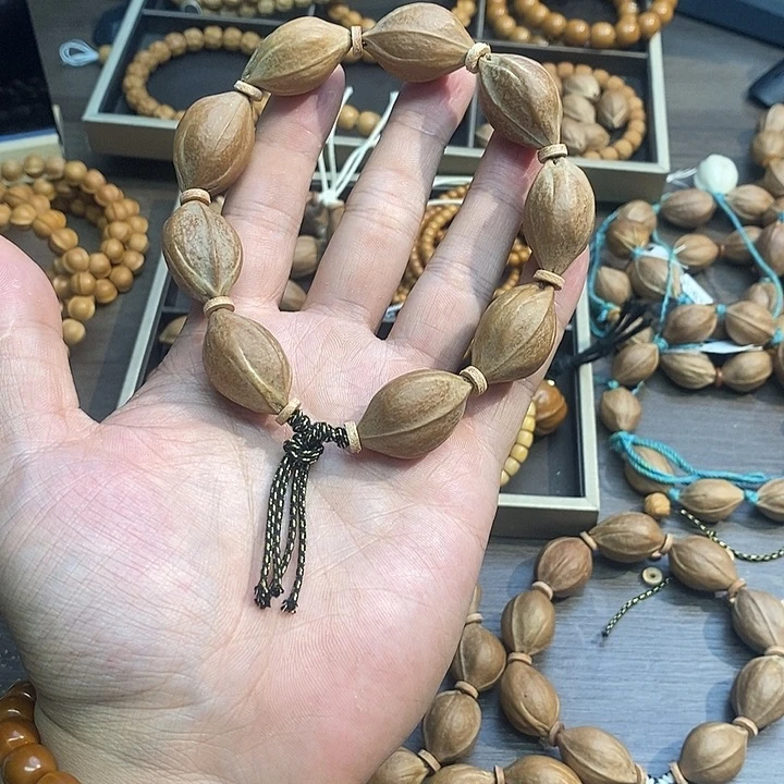 橄榄核手串18梅林铁核九颗