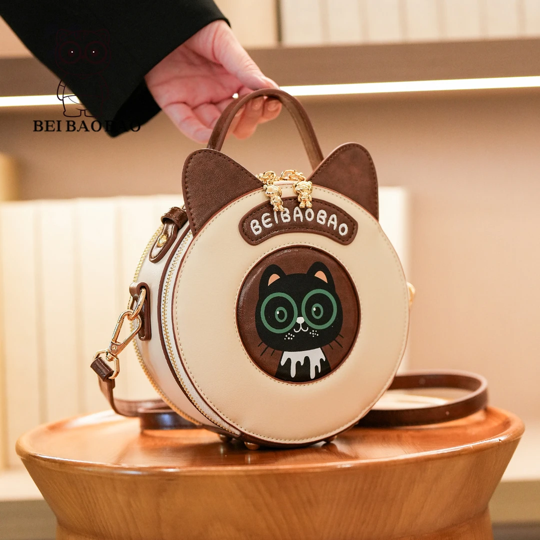 北包包源头工厂新款可爱撞色轻奢猫咪款小圆包女生