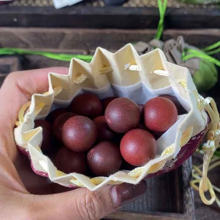 泥塑红麝香珠无打孔瑕疵珠香包约50克