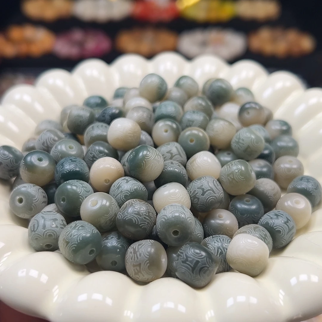 手串菩提根/象牙果卡11飘绿六字桶130颗