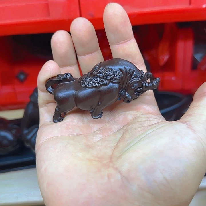 木黑檀木8金钱牛一只