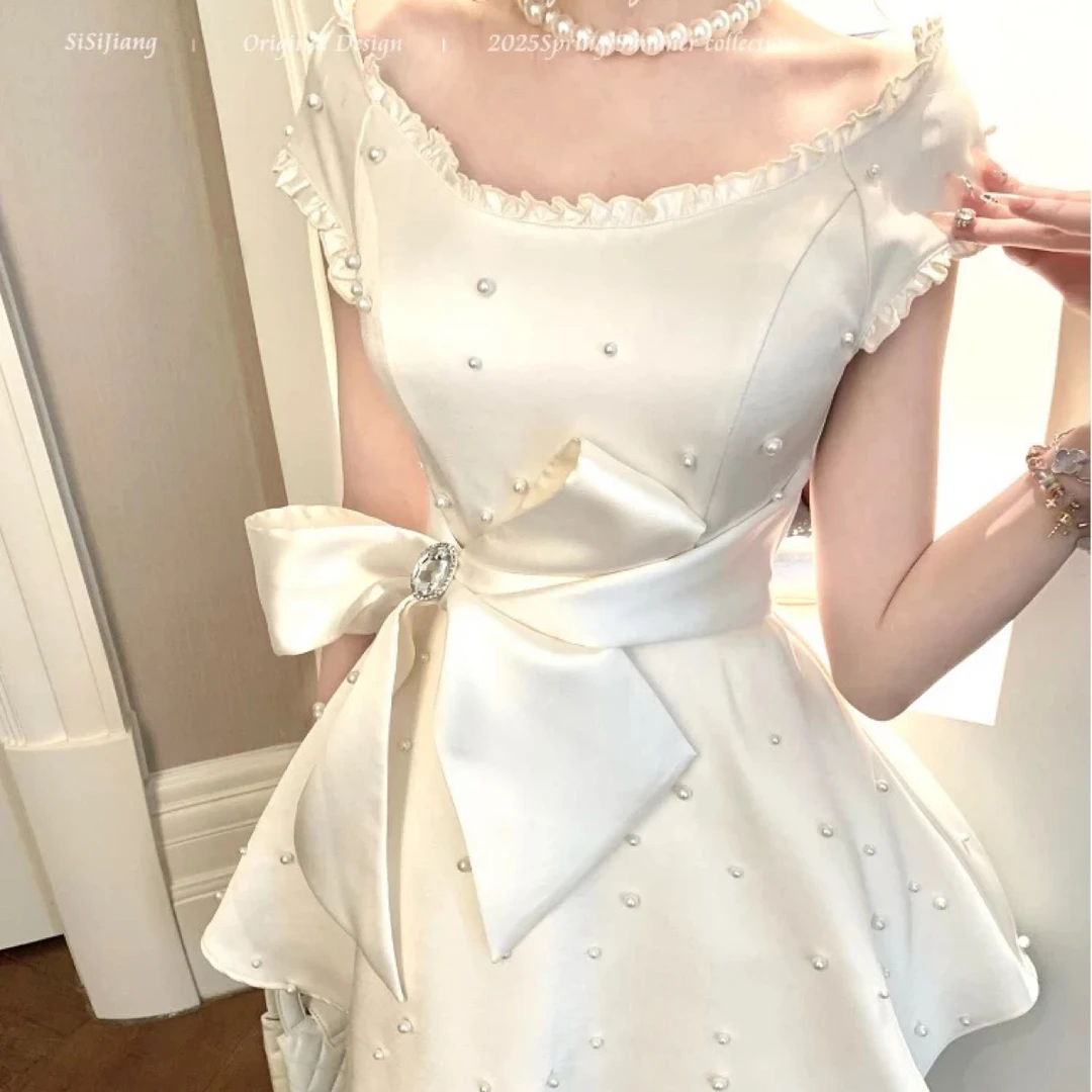 "珍珠公主"千金风花边方领收腰蝴蝶结无袖连衣短裙女夏季名媛公主