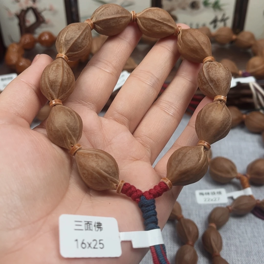 .***.橄榄核吊坠三面佛16.25