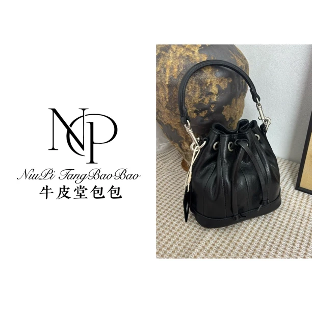 抽绳复古水桶形斜挎包肩包手机包百搭欧美复古做旧单肩