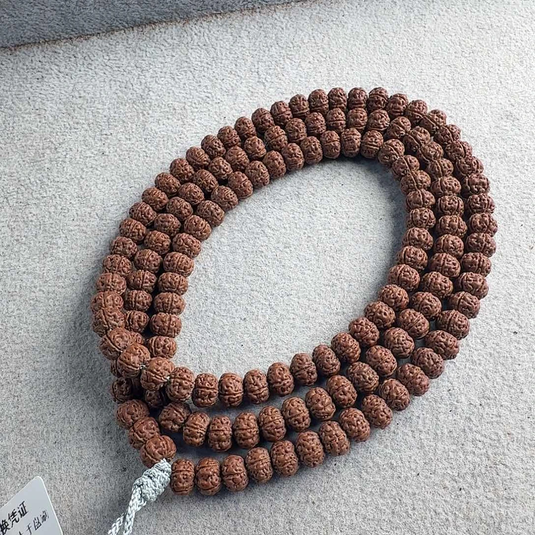 金刚菩提吊坠7.6头货老树王孔边丝黄