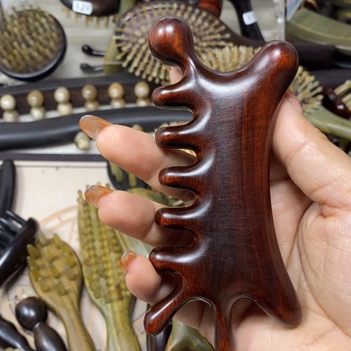 紫檀六合一按摩梳一个