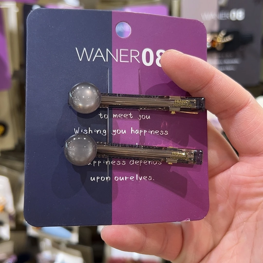 布艺非金属灰色珠珠压夹