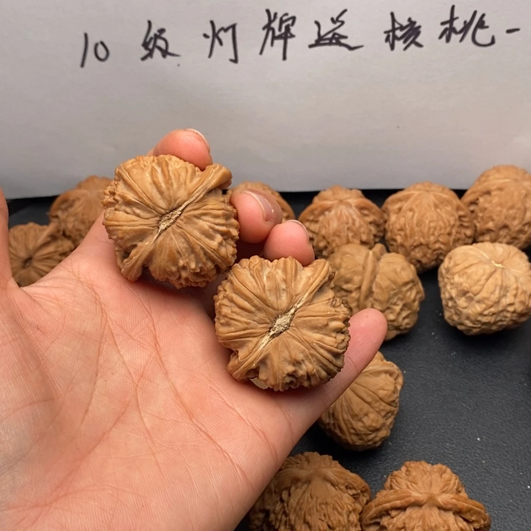 J***文玩核桃把件40白狮子