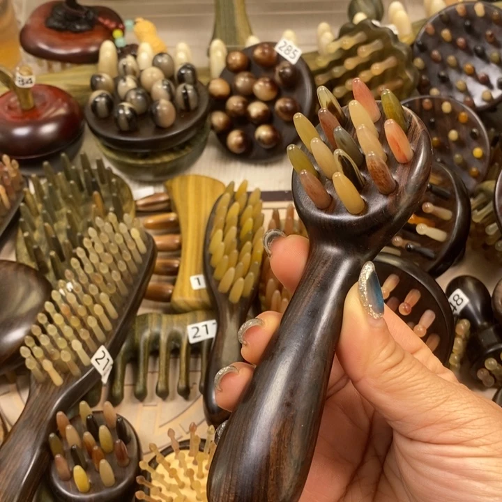 紫光檀15齿羊角梳