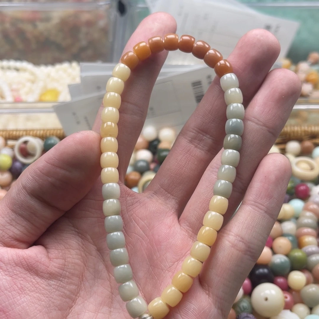 吊坠白玉菩提q7/100+10颗迷你直切