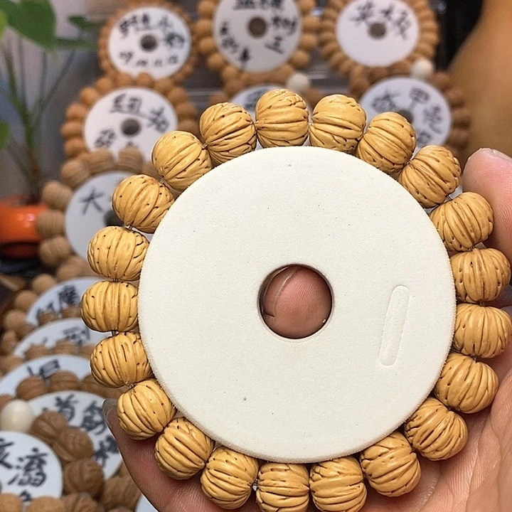 【闪购商品】空****)桃核手串纽扣手串