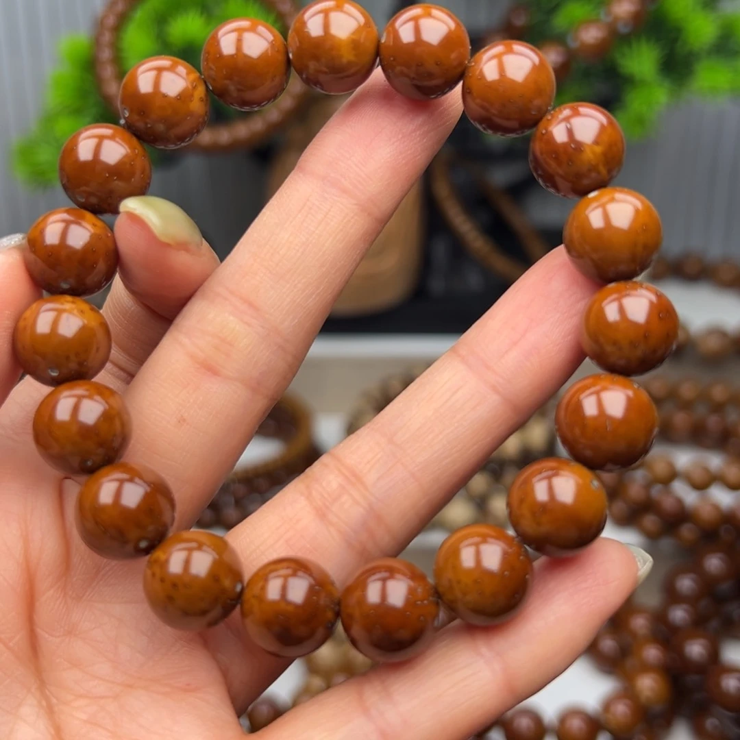 紫金鼠手串M****卡11.8半实心光珠