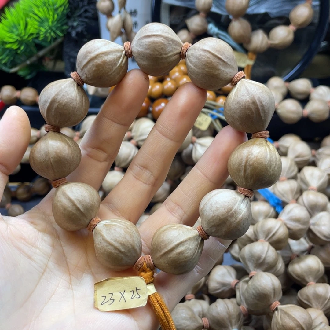 呦***.橄榄核吊坠2325老料