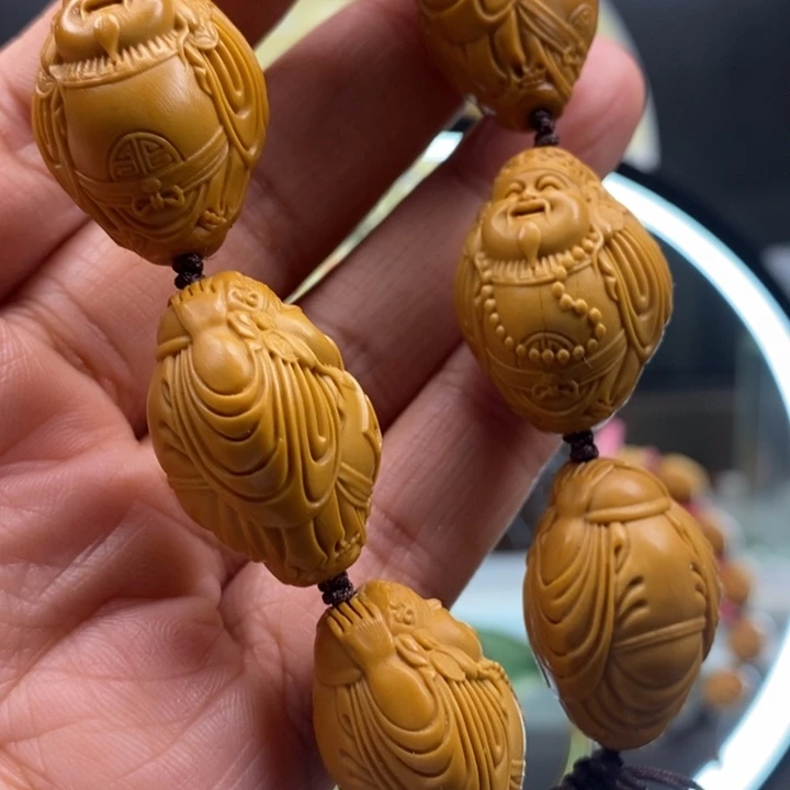 橄榄核吊坠句句斤斤计较斤斤计较