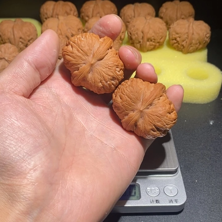 刘***烤把件文玩核桃平谷元宝