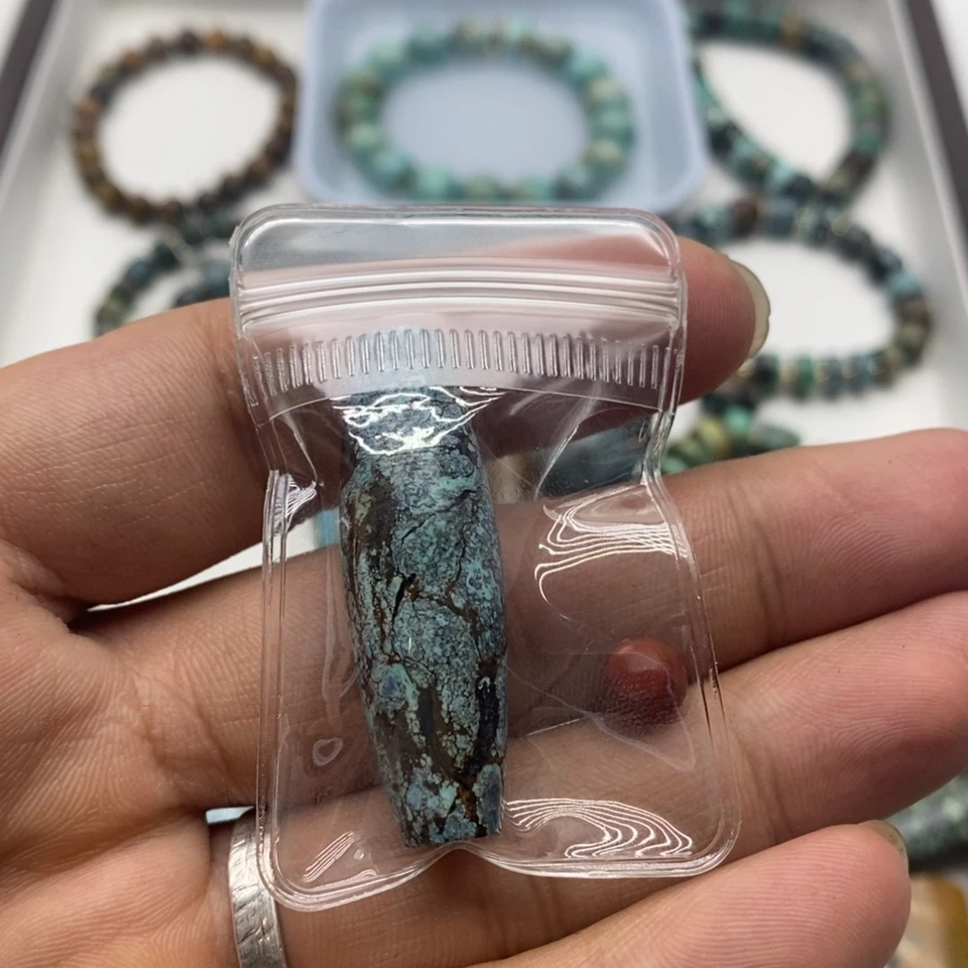 喵***吉未镶嵌南红玛瑙珠宝奇石