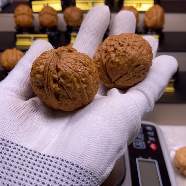 吟***游文玩核桃把件至尊元宝43尺