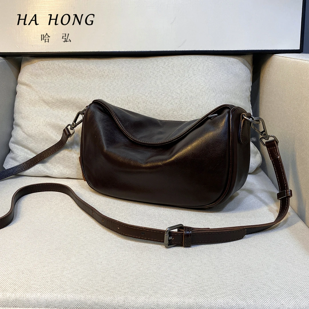 哈弘头层牛皮包包女斜挎中包复古气质软皮2025新款小众设计饺子包