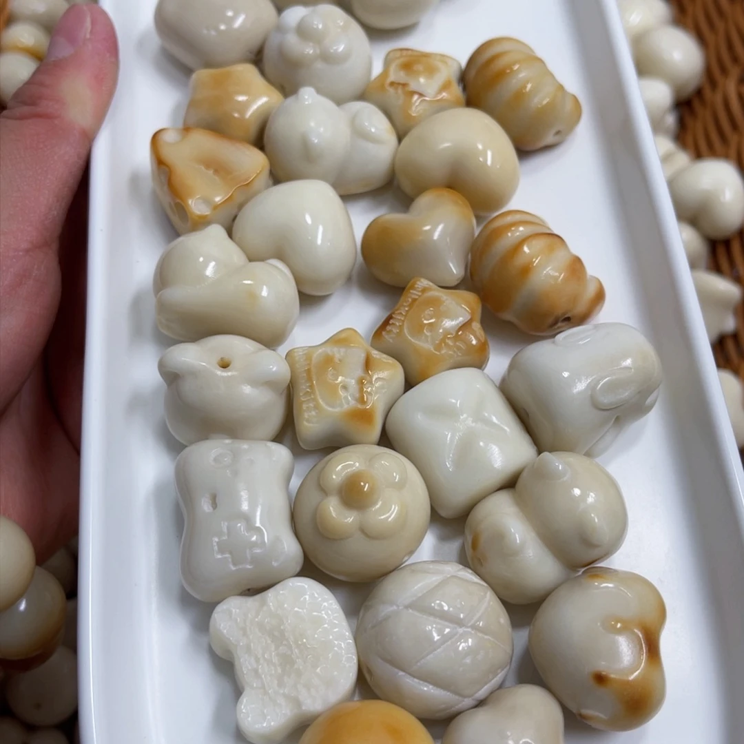 吊坠白玉菩提b15-25mm/5颗象牙果瑕