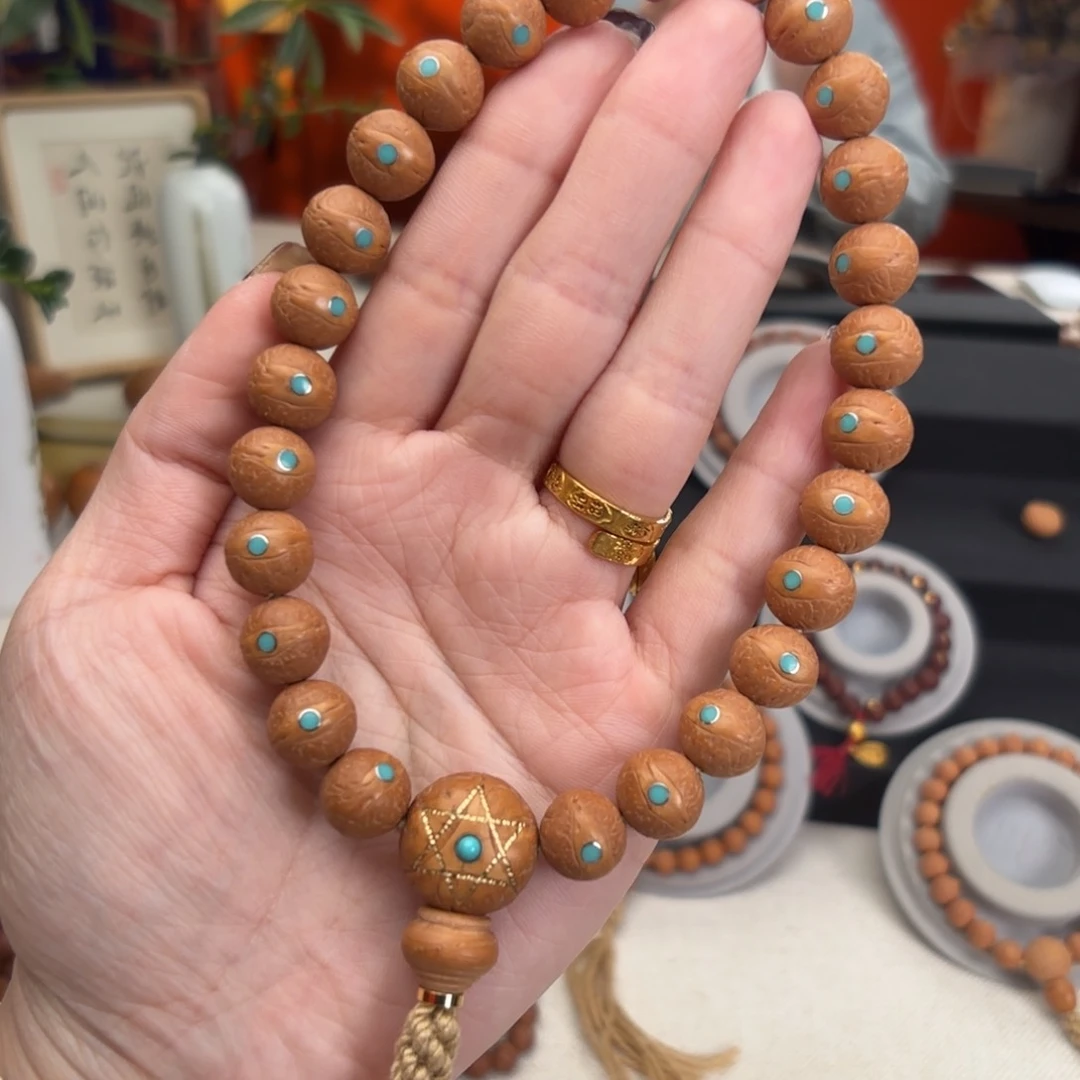 凤眼菩提吊坠12毫米手持27颗松
