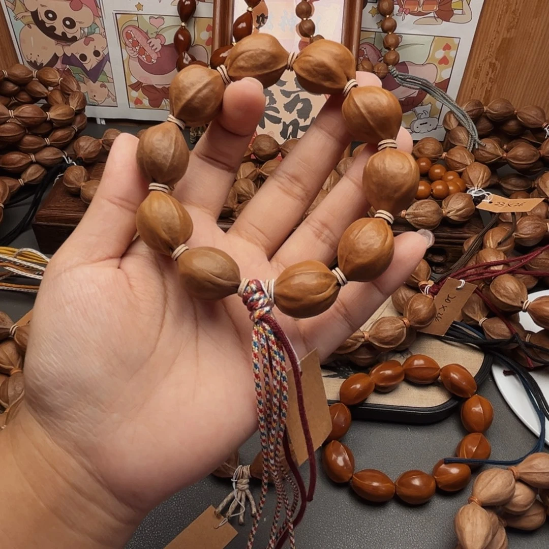 A***.橄榄核手串19.24梅林铁核