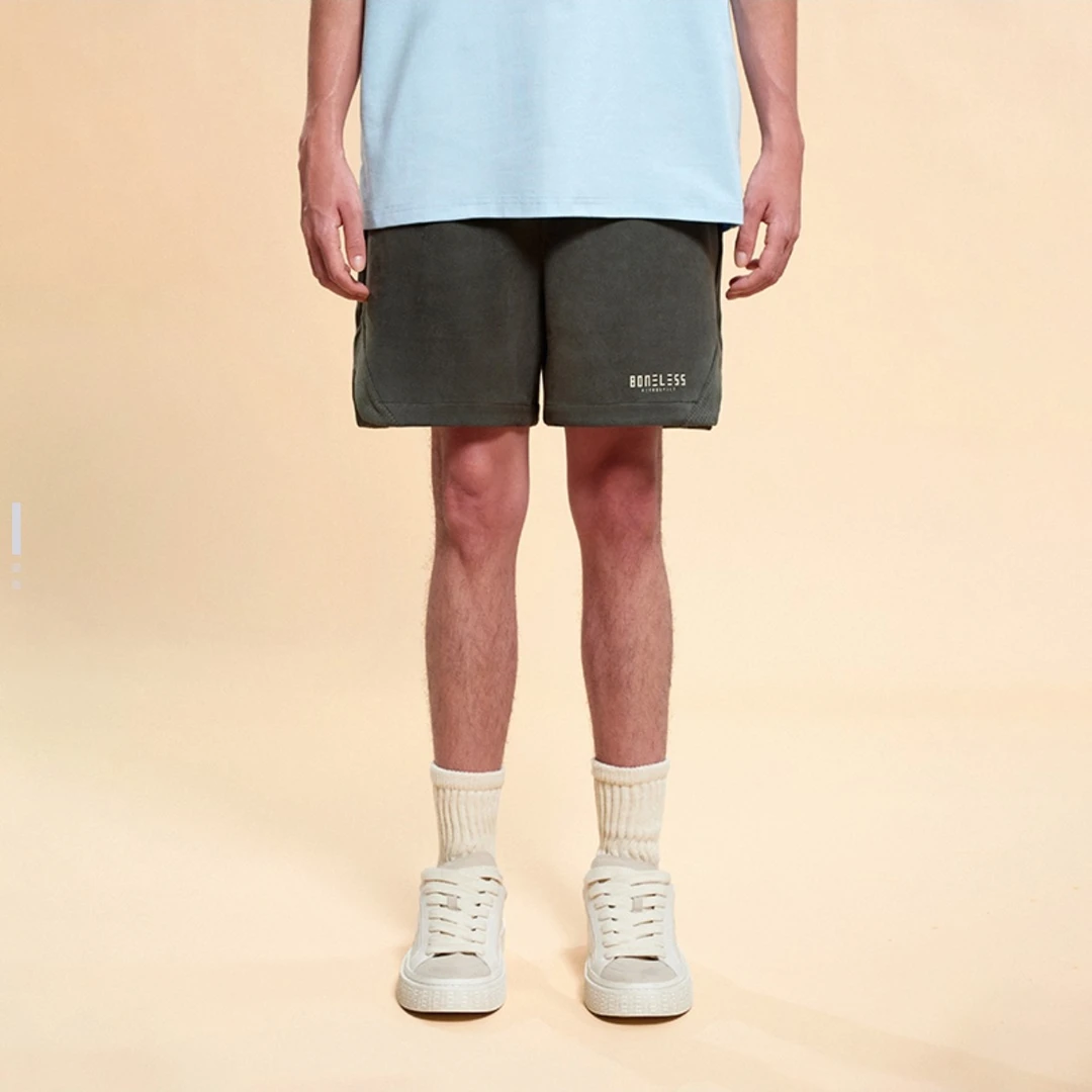 C05(ST)-52352-BON夏季打孔烧花拼接防麑皮时尚短裤