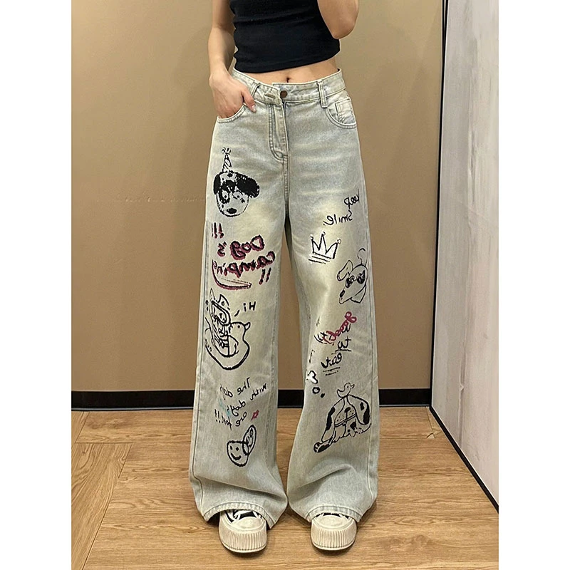 300斤卡通涂鸦牛仔裤女秋季大码胖mm宽松显瘦梨型身材直筒阔腿裤