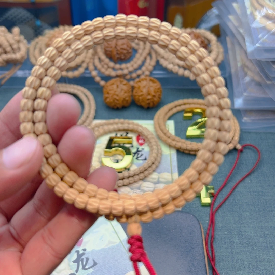 阿***龙柏香籽/百香籽吊坠