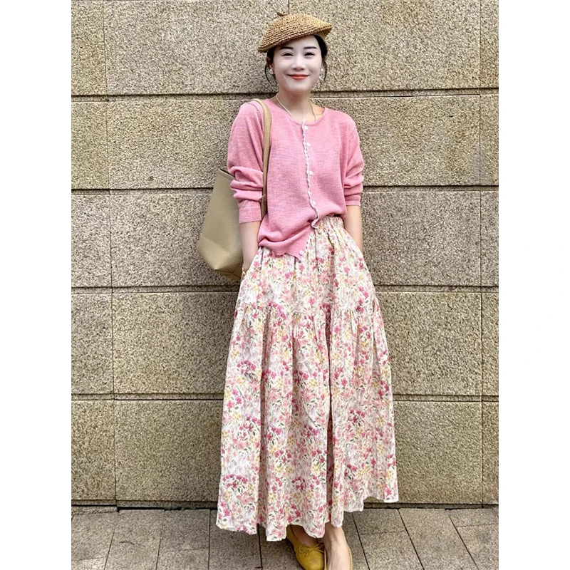 开春穿搭2025超火高级感小香风休闲粉色针织衫碎花半身裙两件套装