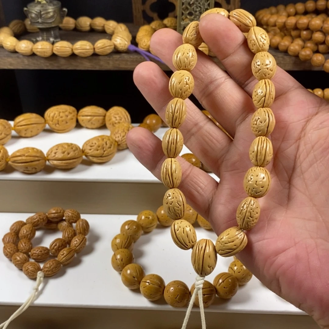 大***小桃核吊坠沈阳奶油皮钱袋子手持