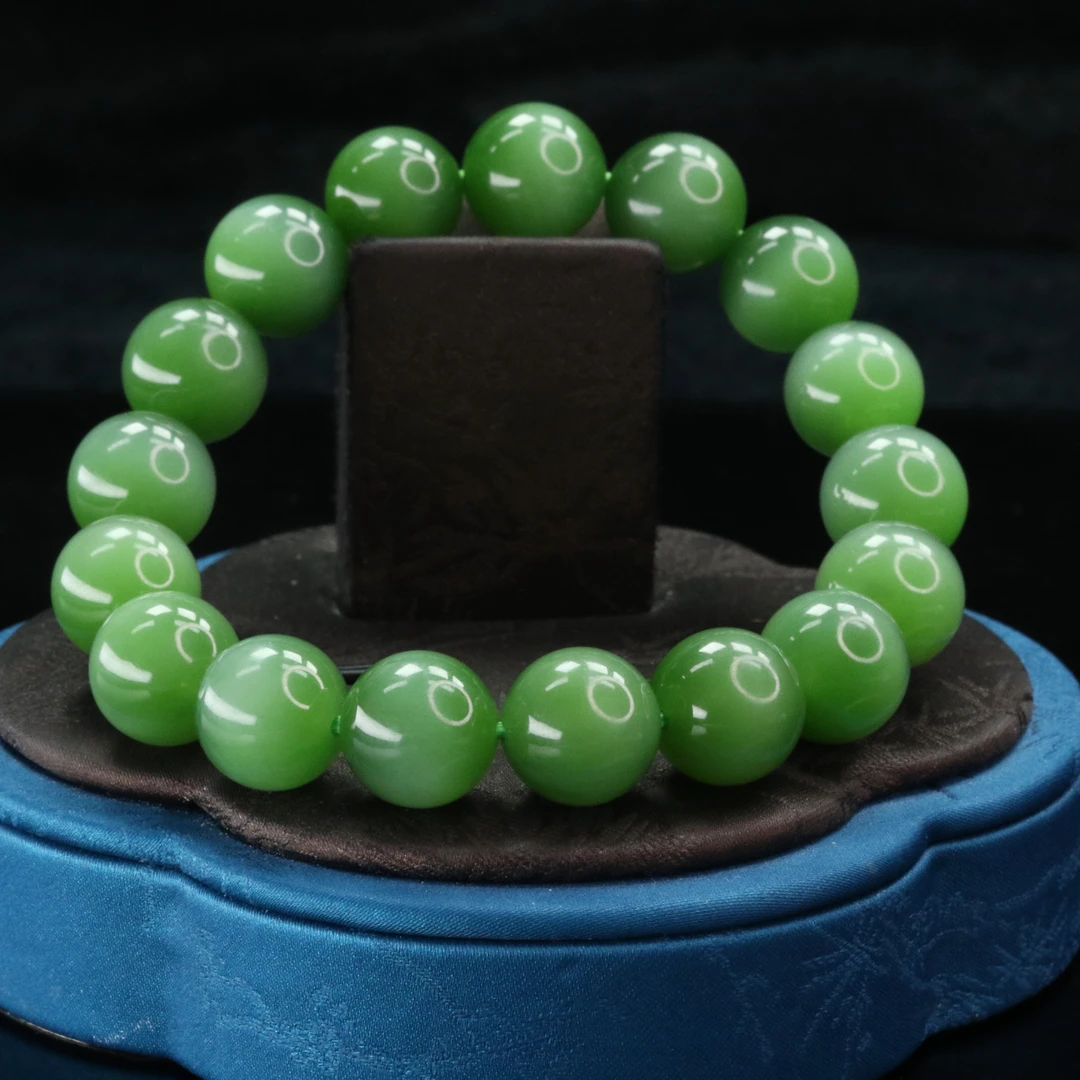 6和田玉俄七碧玉猫眼手串/300438保利厦门拍卖