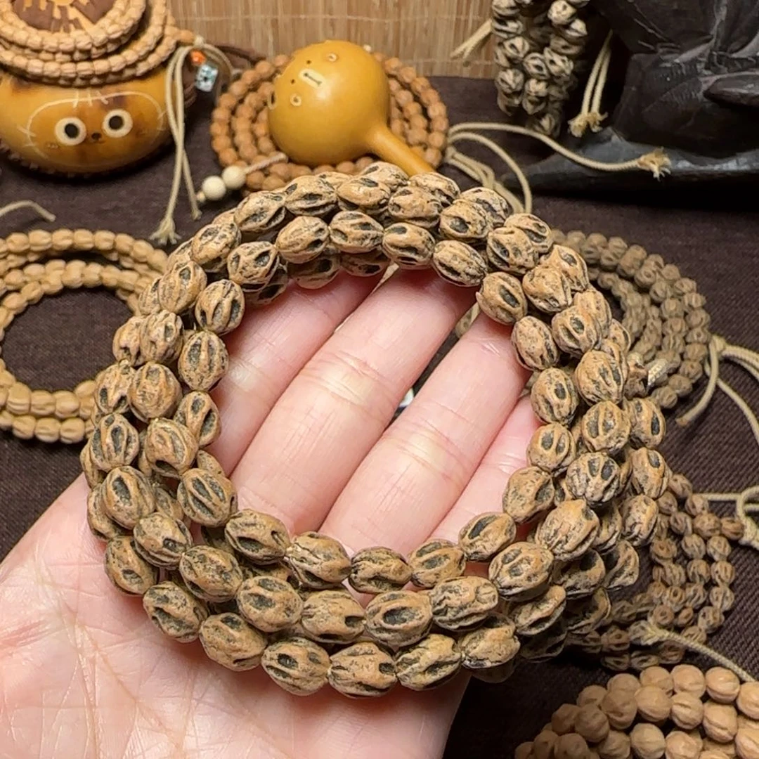 被***嘴柏香籽/百香籽吊坠