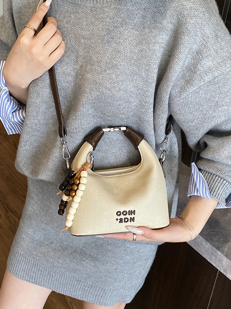 00Purse轻奢女包高级感小众包包帆布单肩斜挎包韩版饺子包6174