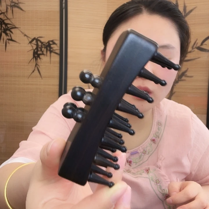 叶***子紫光檀方形三排梳子瑕疵