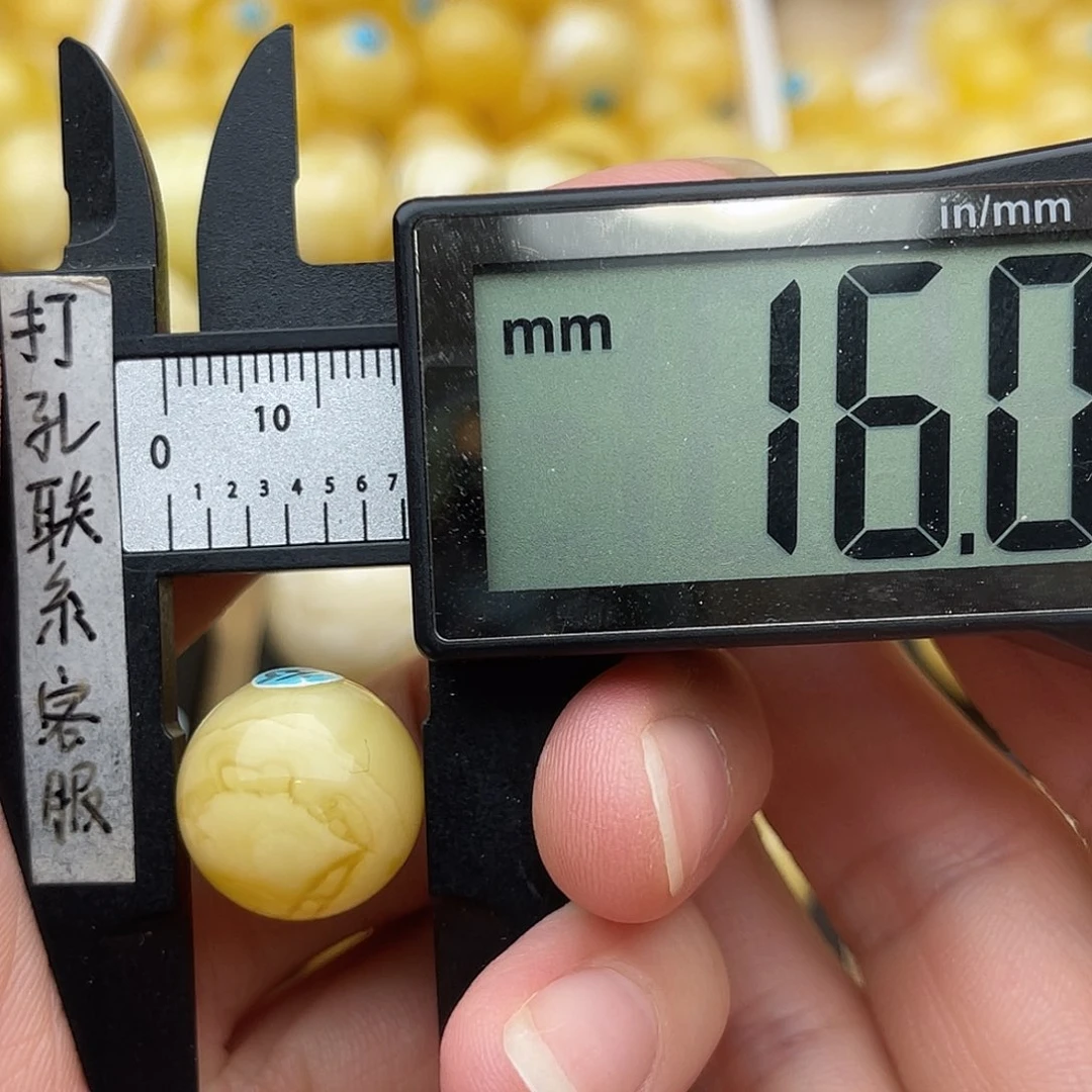 裸石琥珀未镶嵌大**?蜜蜡圆珠鸽