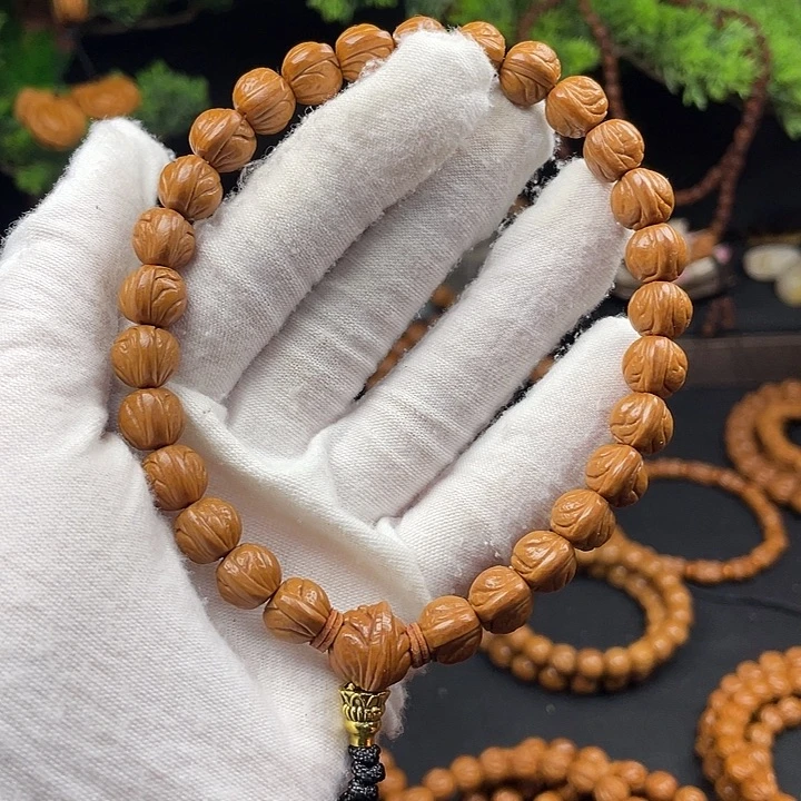 孤***雁桃核吊坠秦岭龙纹桃核