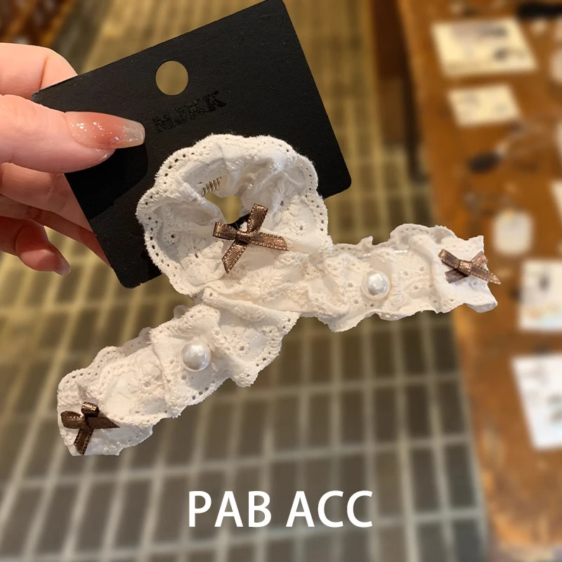 2025减龄少女感蝴蝶结镂空蕾丝鲨鱼夹韩国高端奶白色盘发抓夹顶夹