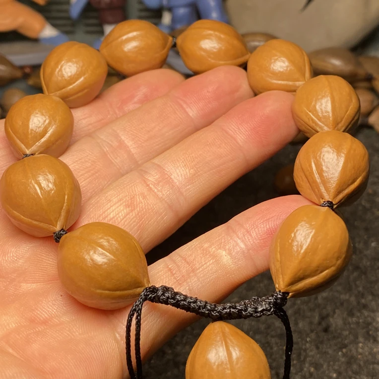 橄榄核水晶核正圆手串短圆素串