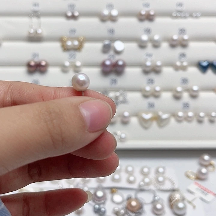 小***丫淡水珍珠银S925镶嵌耳饰