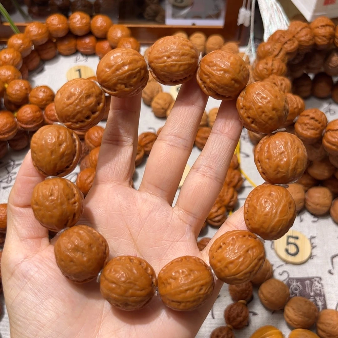 大***重吊坠桃核光头一道筋