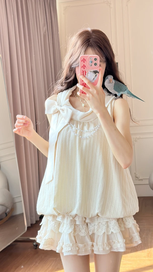 小小仟 初恋褶皱-杏色翻领蝴蝶结无袖上衣女夏季新款设计感