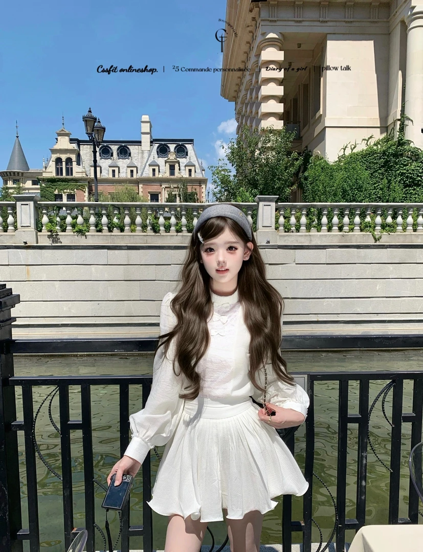 法式早秋季新款高级感蕾丝拼接蝴蝶结衬衫上衣女+高腰短裙两件套