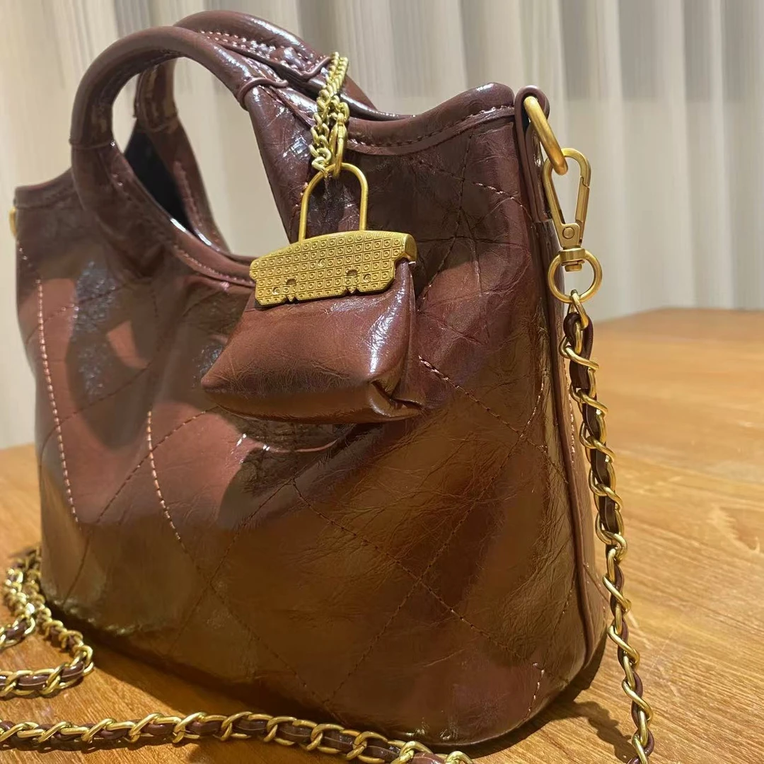 HIRMRIS手工真皮包金扣22-550981-棕红   双手提水桶阳  子母