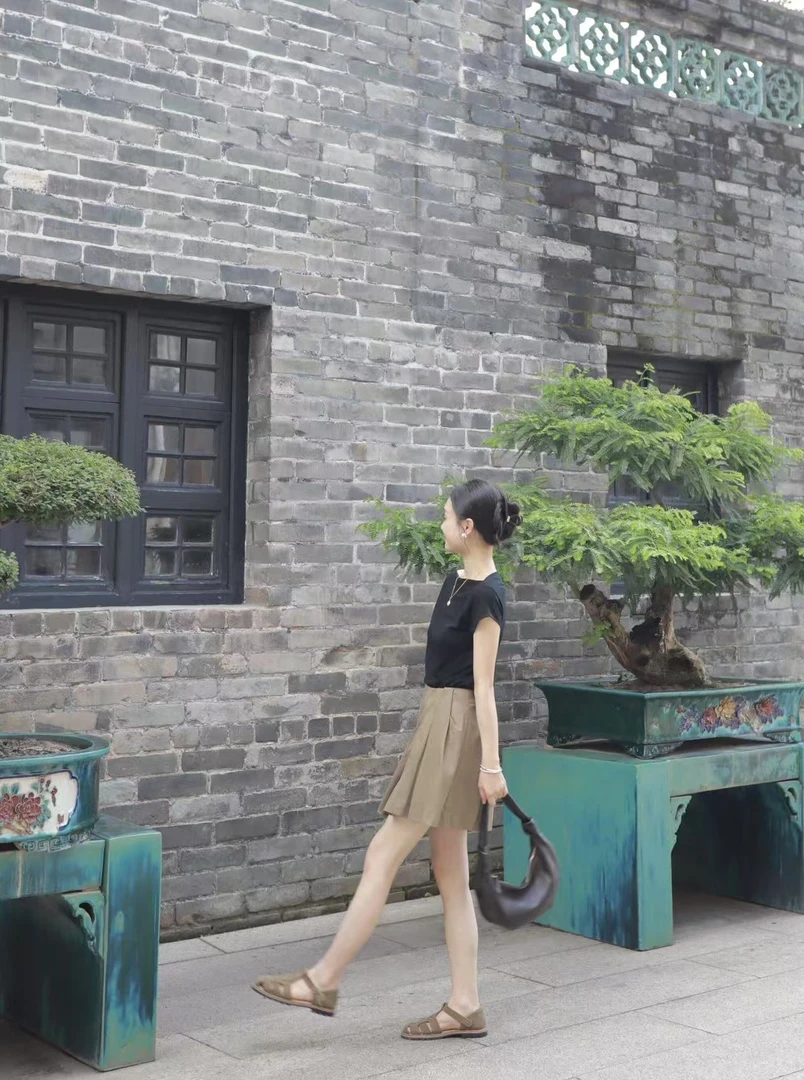 2025夏季新款法式复古一字肩扭绳短袖高级感修身上衣百搭半裙套装