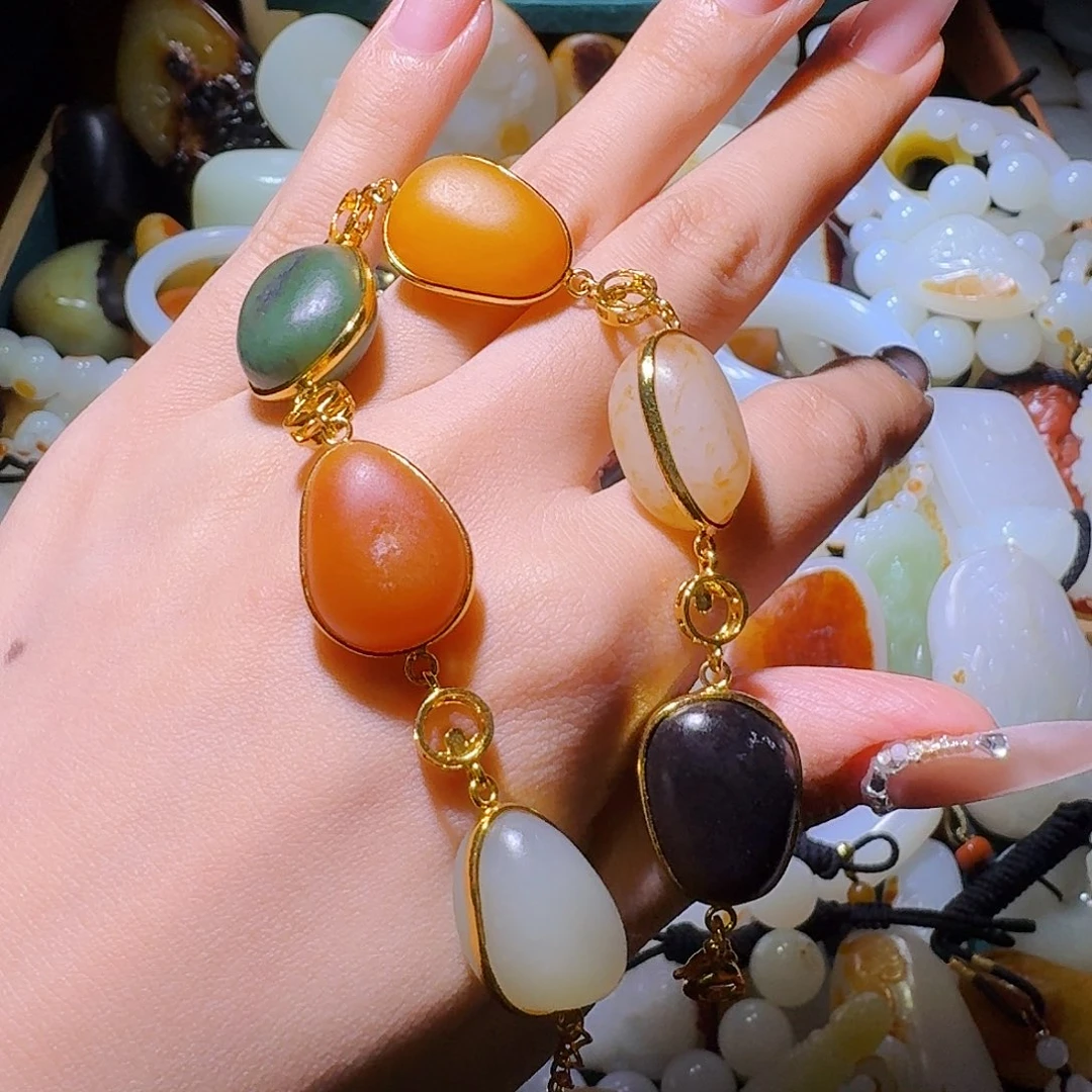 封***༻和田玉未镶嵌挂件