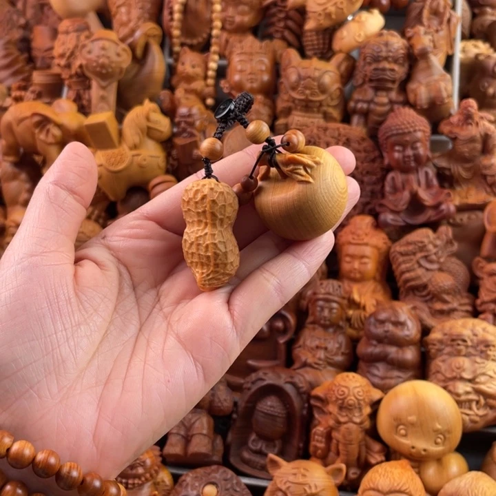 崖柏赵*人一物一拍手把件